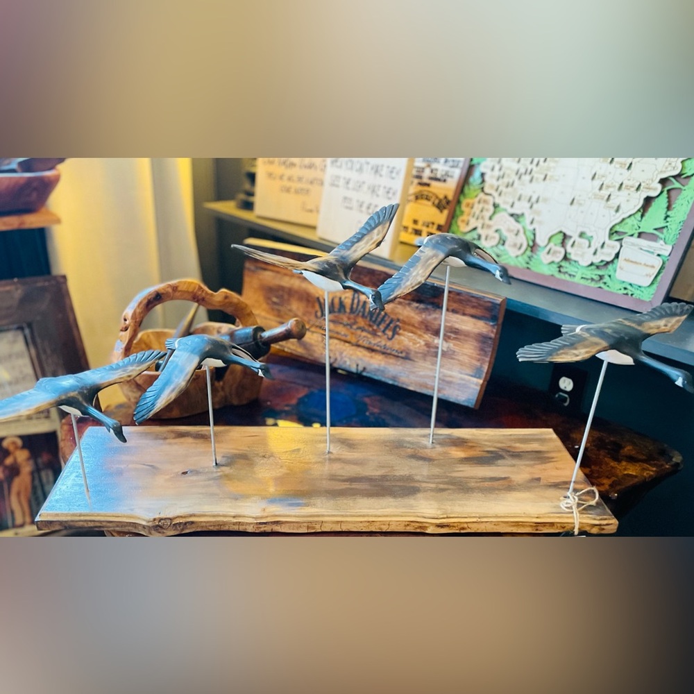 This 30”L x 9.5”W x 14” H 5 geese in flight wood sculpture is one of a kind!